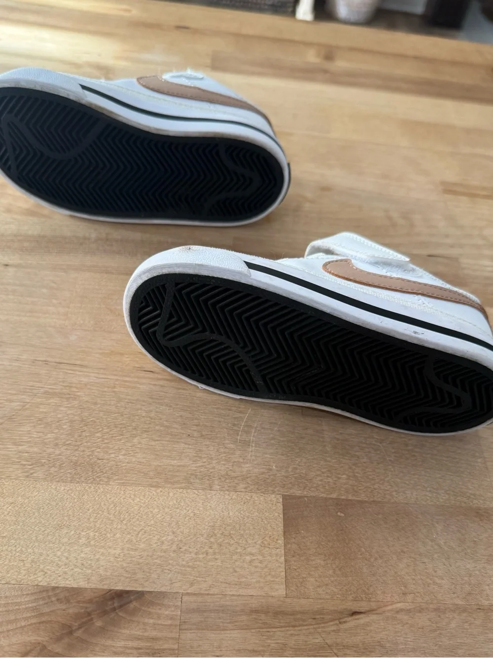 Nike Kids White Sneakers with Metallic Gold Swoosh